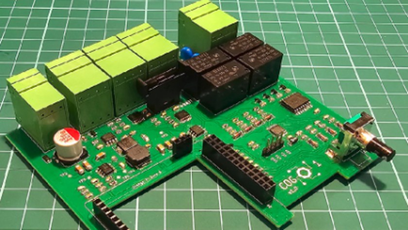 Assembled Cog1 board with green terminal blocks, relays and the Orange Pi connector